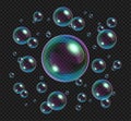 Realistic soap bubbles with rainbow reflection isolated on transparent background. Royalty Free Stock Photo