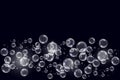 Realistic soap bubbles with rainbow reflection set isolated on the black background. Royalty Free Stock Photo