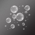 Realistic soap bubbles with rainbow reflection set isolated on the black transparent background. Royalty Free Stock Photo