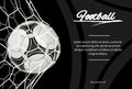 Realistic soccer ball in net on black background.