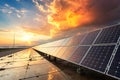 Realistic solar panels with a reflective surface under a dramatic sunset sky. the sunlight glows brightly, illuminating Royalty Free Stock Photo