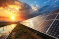 Realistic solar panels with a reflective surface under a dramatic sunset sky. the sunlight glows brightly, illuminating Royalty Free Stock Photo