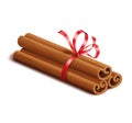 Realistic spices, cinnamon sticks with red bow isolated on white