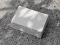 Realistic stack of White Business Cards Mockup on the concrete background with shadows from plant