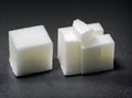 realistic sugar cubes on black background POV