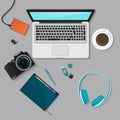 Realistic technology workplace organization. Top view of color work desk with laptop, smartphone, pc, diary, glasses Royalty Free Stock Photo