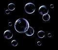 Realistic transparent soap bubbles with rainbow reflection. Royalty Free Stock Photo