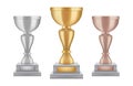 Realistic trophy. Gold silver bronze award cups collection. Vector shine trophies isolated on white background Royalty Free Stock Photo