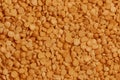 Realistic vector illustration of a background of raw yellow split pea variety on a wooden surface, top view