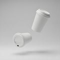 Realistic white disposable mockup cofee cups in mid-air perfect for mockup and pro designs Royalty Free Stock Photo