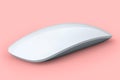 Realistic white wireless computer mouse with touch isolated on pink background. Royalty Free Stock Photo
