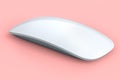 Realistic white wireless computer mouse with touch isolated on pink background. Royalty Free Stock Photo