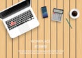 Realistic workplace desktop. Top view desk table on wood. With metal pencil, mobile smartphone, coffee, calculator and laptop. Royalty Free Stock Photo