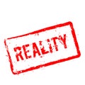 Reality red rubber stamp isolated on white. Royalty Free Stock Photo