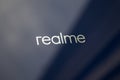 Realme logo on a blue background