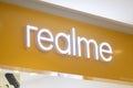 Realme sign displayed in front of the shop