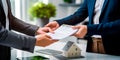 A realtor presenting a title deed to a new homeowner, symbolizing the official transfer of ownership.