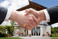 Realtor Shaking Hands With Client After Selling House Royalty Free Stock Photo