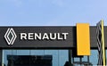 Renault official dealership with brand name and logo of the french automaker .