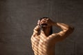 Rear back view of young man washing his body and head Royalty Free Stock Photo