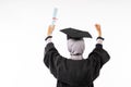 Rear behind view photo of female college graduate wearing toga Royalty Free Stock Photo