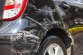 Rear of black car crash get damaged by accident on road