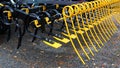 Rear bright yellow spring rakes on modern tine agricultural harrows Multiva Optima T800 from Finland