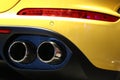 Tailpipe on sports car Royalty Free Stock Photo