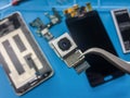 Rear camera module on blurred smartphone component Royalty Free Stock Photo