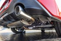 Rear car exhaust pipe and suspension Royalty Free Stock Photo