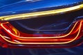 Rear car light detail in blue red tone. Vehicle part. Royalty Free Stock Photo