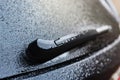 Rear car windscreen wipers frozen on winter morning. Royalty Free Stock Photo