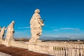 Rome - Rear view of the statues on top of Saint Peter Basilica in Vatican City, Rome, Lazio, Europe Royalty Free Stock Photo