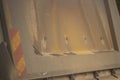 Rear door of a truck. Truck body. Yellow side wall of the container for the transfer of goods.