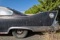 The rear driver side quarter panel of an antique 1960 Plymouth Fury in Wells, Nevada, USA - June 18, 2022