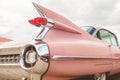 Rear end of a pink classic Cadillac car Royalty Free Stock Photo