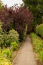 Rear entrance to the rose garden, long pathway with nobody in view