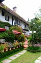 Rear garden and seating area of colonial bungalow Ye Olde Smokehouse Hotel Cameron Highlands Malaysia