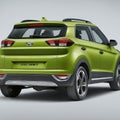 Rear of a Green Hyundai Venue Subcompact SUV