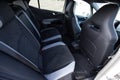 Rear leather passenger seats in modern lux car. Leather car passenger seat. Electric car seat for rear passengers in