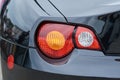 Rear light black sports car Royalty Free Stock Photo