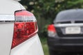 Rear light of the white car out door Royalty Free Stock Photo