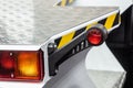 rear lights and brake lights of the hydraulic lift. Focus on rear lights Royalty Free Stock Photo