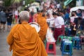 Old Mon monk walk to alms in village, Sangkhla Buri Royalty Free Stock Photo