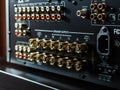 Rear part of a power music amplifier with line-out, speakers inputs, antenna Royalty Free Stock Photo