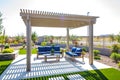 Rear Patio Pergola With Wooden Furniture Royalty Free Stock Photo