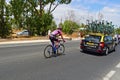 Jetse Bol, Team Manzana Postobon Following The Lotto Jumbo Team Car Royalty Free Stock Photo