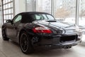 Rear quarter view of the 2006 sport porsche boxster s sedan prepared for sale and exhibited in the showroom with a polished shiny