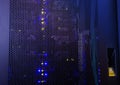 rear of rack server switching equipment illuminated from within Royalty Free Stock Photo
