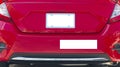 Rear of Red Car With Blank White License Plate and Bumper Sticker Royalty Free Stock Photo